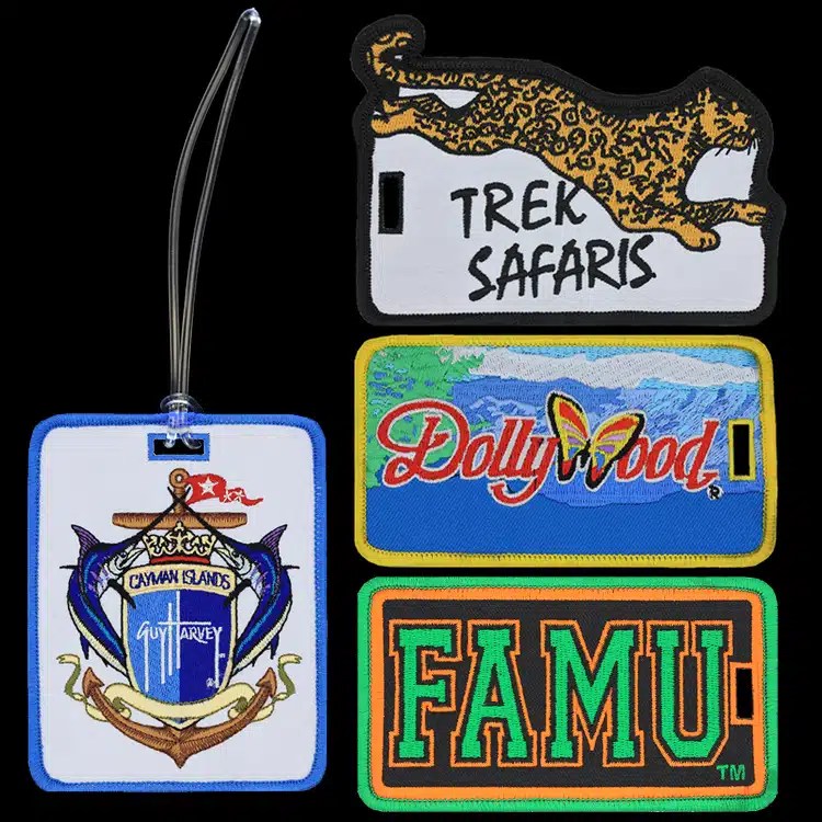 Embroidered luggage tags including a Trek Safaris leopard design, a Dollywood tag, an FAMU tag and an anchor crest tag with a clear strap