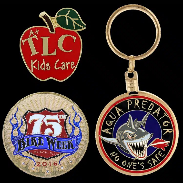 Category tile of assorted custom challenge coins and enamel pieces, including a shark design, an anniversary coin and a coin on a keyring