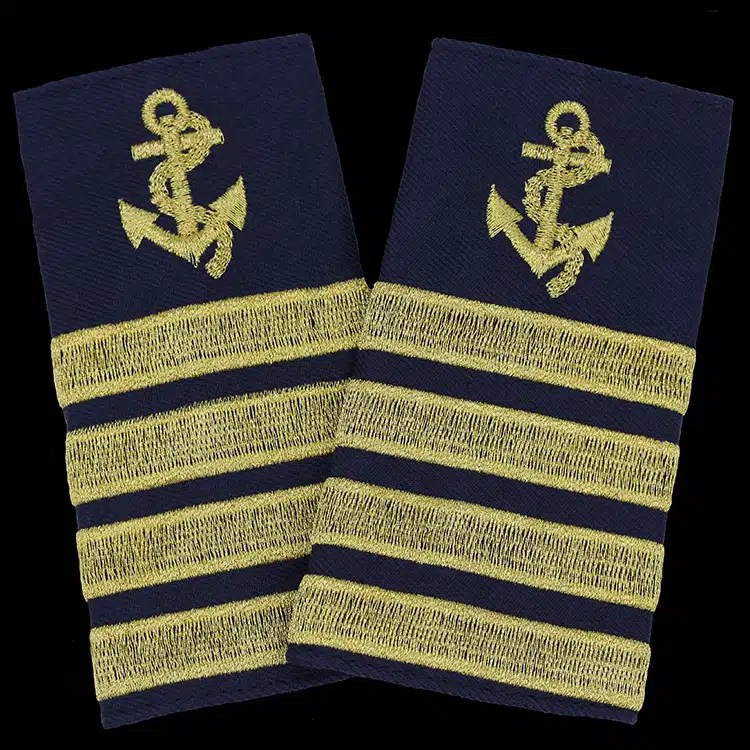 Pair of navy epaulet covers with a gold anchor and three gold stripes