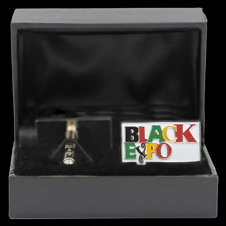 Enamel cuff links in a black presentation box.
